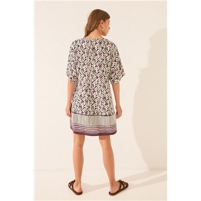 Camisola midi estampado hojas