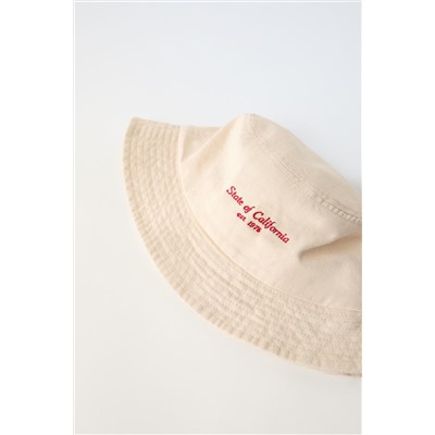 EMBROIDERED SLOGAN BUCKET HAT