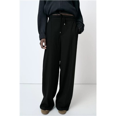 WIDE-LEG TROUSERS WITH ELASTIC WAISTBAND