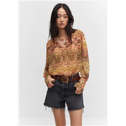 Blusa estampada cierre lazo