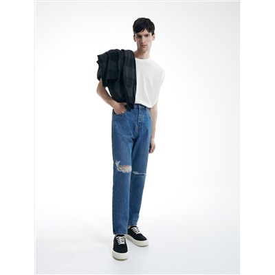 Jeans im Carrot-Fit in Used-Optik