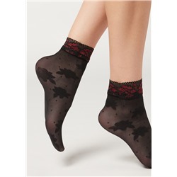 Gemusterte transparente Socken