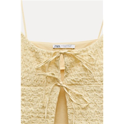 TEXTURED CROP TOP WITH RUFFLES