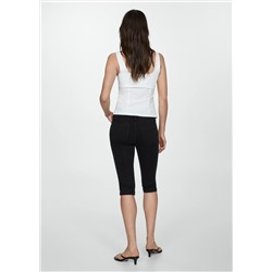 Jeans slim capri costuras decorativas