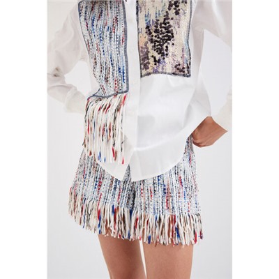 Camisa de patch y flecos