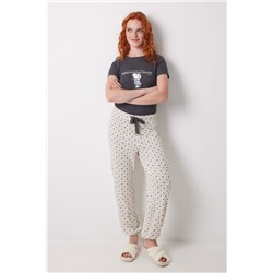 Pantalón largo estampado cuadros y flores