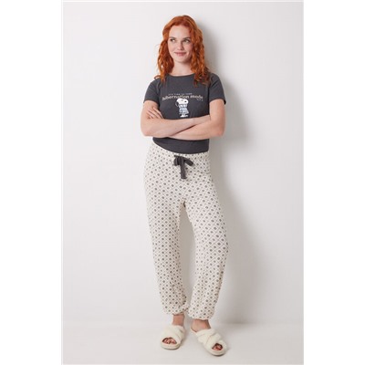 Pantalón largo estampado cuadros y flores