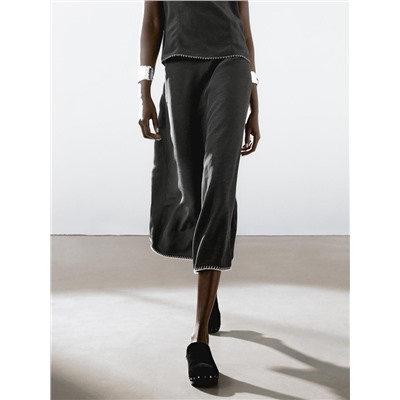 Midi skirt with topstitching detail on the hem
