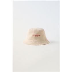 EMBROIDERED SLOGAN BUCKET HAT