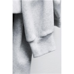 KNOTTED PLUSH SWEATSHIRT