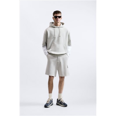 SUDADERA OVERSIZE CAPUCHA