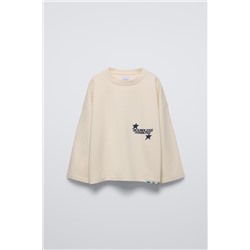 T-SHIRT WITH SLOGAN