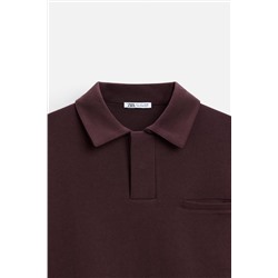POLO INTERLOCK BOLSILLO