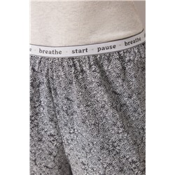 Pantalón largo estampado flores verdes