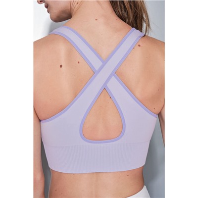 Sujetador deportivo reversible lila y blanco