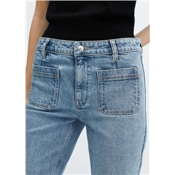 Jeans flare crop bolsillos