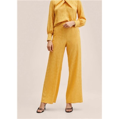 Pantalón fluido textura -  Mujer | MANGO OUTLET Melilla