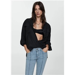 Jeans slim capri costuras decorativas