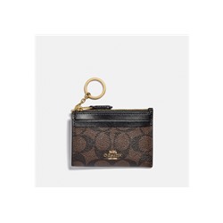 Mini Skinny Id Case In Signature Canvas
