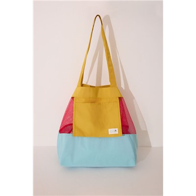 Bolso mesh y nylon estampado blanco