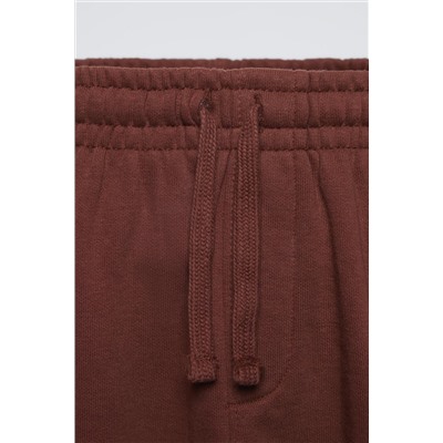 TROUSERS WITH EMBROIDERED SLOGAN