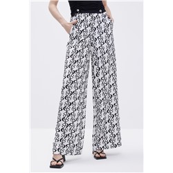 Pantalón palazzo de seda de tiro alto Blanco