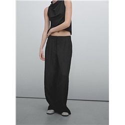 Technical trousers with darts