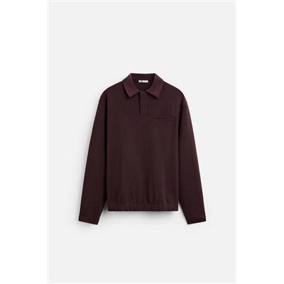 POLO INTERLOCK BOLSILLO