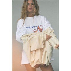 T-SHIRT WITH CONTRAST SLOGAN