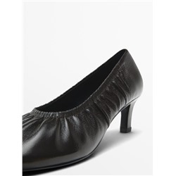 Gathered high heel shoes