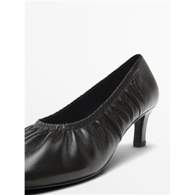 Gathered high heel shoes