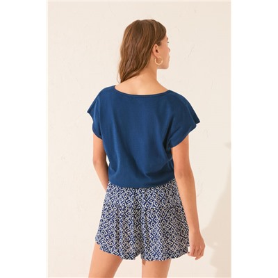 Pantalón corto estampado sello azul