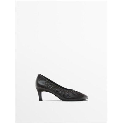 Gathered high heel shoes