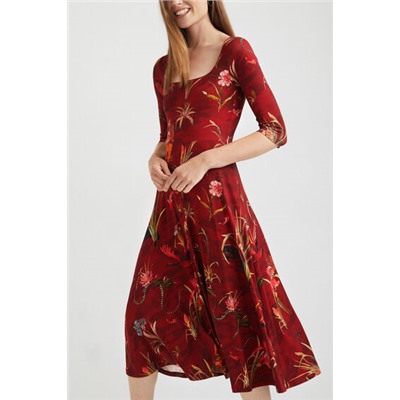 Vestido escotado vuelo