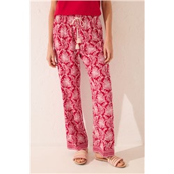 Pantalón largo viscosa estampado hojas rojo