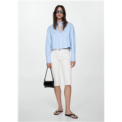 Jeans slim capri costuras decorativas