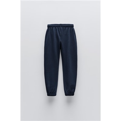 TROUSERS WITH EMBROIDERED SLOGAN