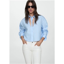 Jeans slim capri costuras decorativas