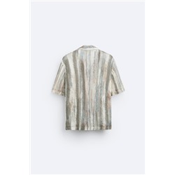 CAMISA CALADA ESTAMPADO ABSTRACTO
