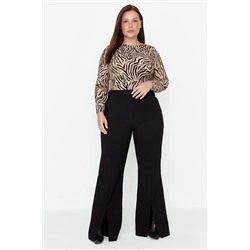 Trendyol Curve Siyah Paçası Yırtmaç Detaylı Wide Leg Dokuma Pantolon TBBAW23AR00008