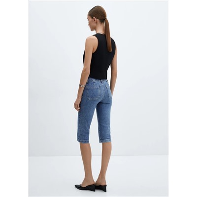 Jeans capri costuras decorativas