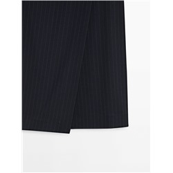 Falda midi pareo raya diplomática