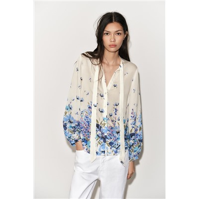 PRINTED BLOUSE WITH TIED DETAIL