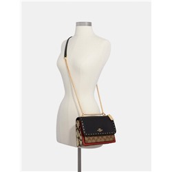 Klare Crossbody In Signature Canvas With Rivets