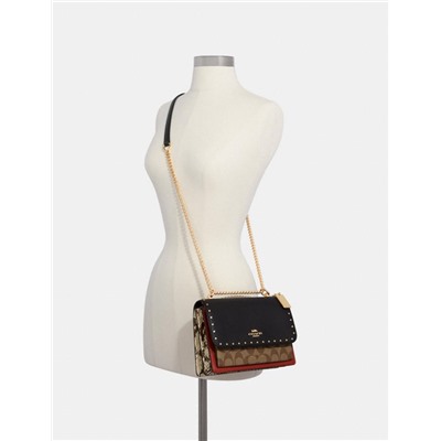 Klare Crossbody In Signature Canvas With Rivets