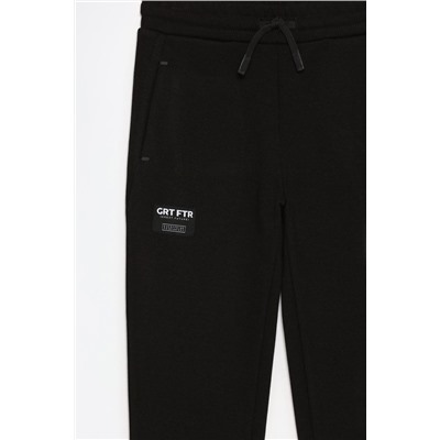 Pantalón jogger deportivo interlock