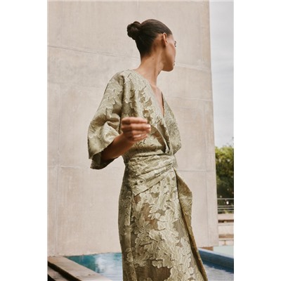 TEXTURED DRAPED DRESS