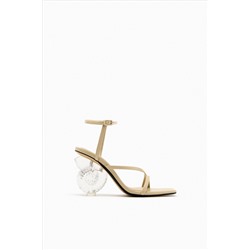 LEATHER SANDALS WITH SEASHELL HEEL