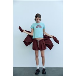 T-SHIRT WITH SLOGAN
