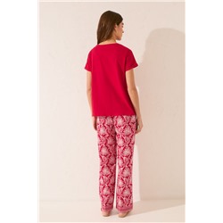Pantalón largo viscosa estampado hojas rojo